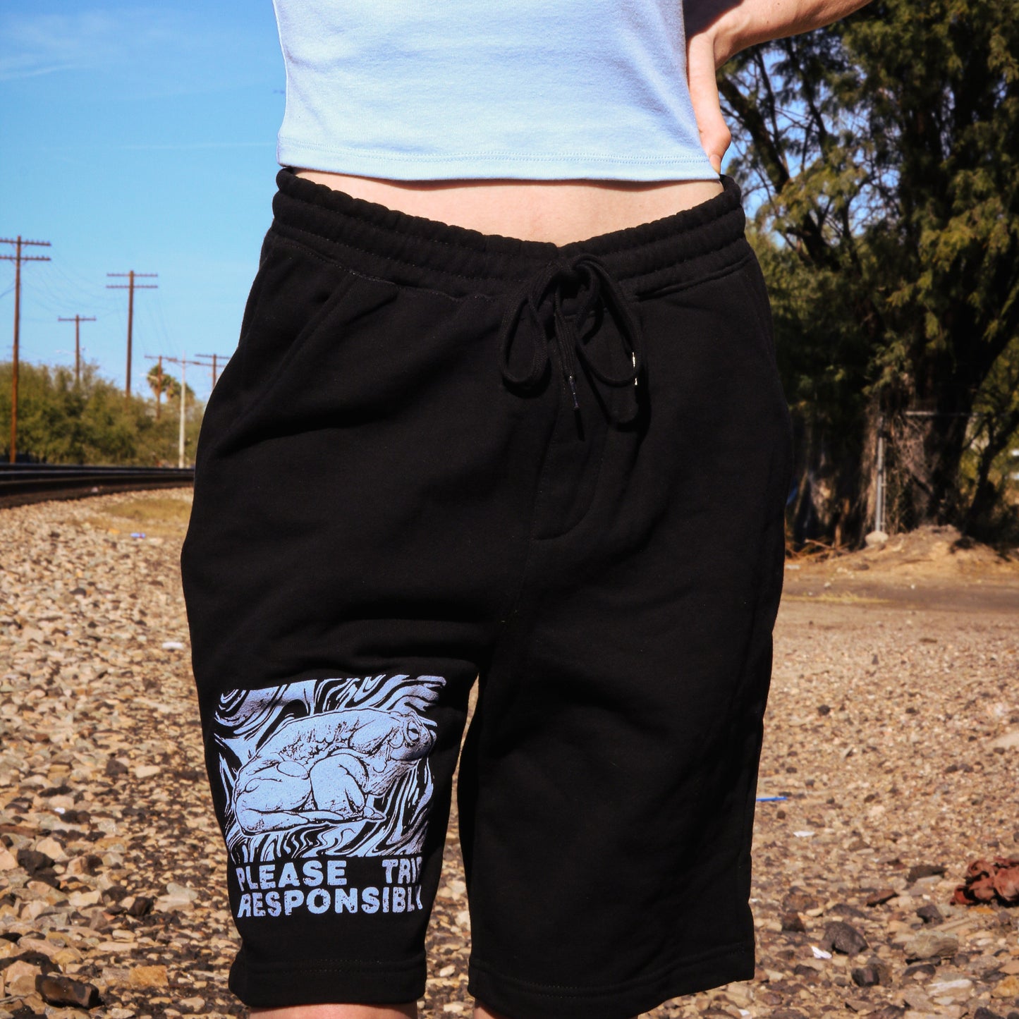 "Please Trip Responsibly" - Blue Sky on Black Sweatshorts